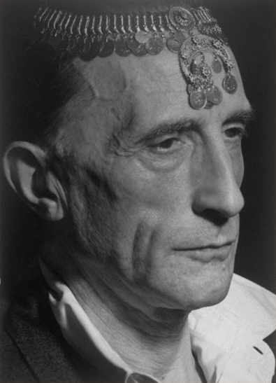 man-ray-marcel-duchamp-with-turkish-coin-necklace-on-forehead-hollywood-1949-gelatin-silver-print