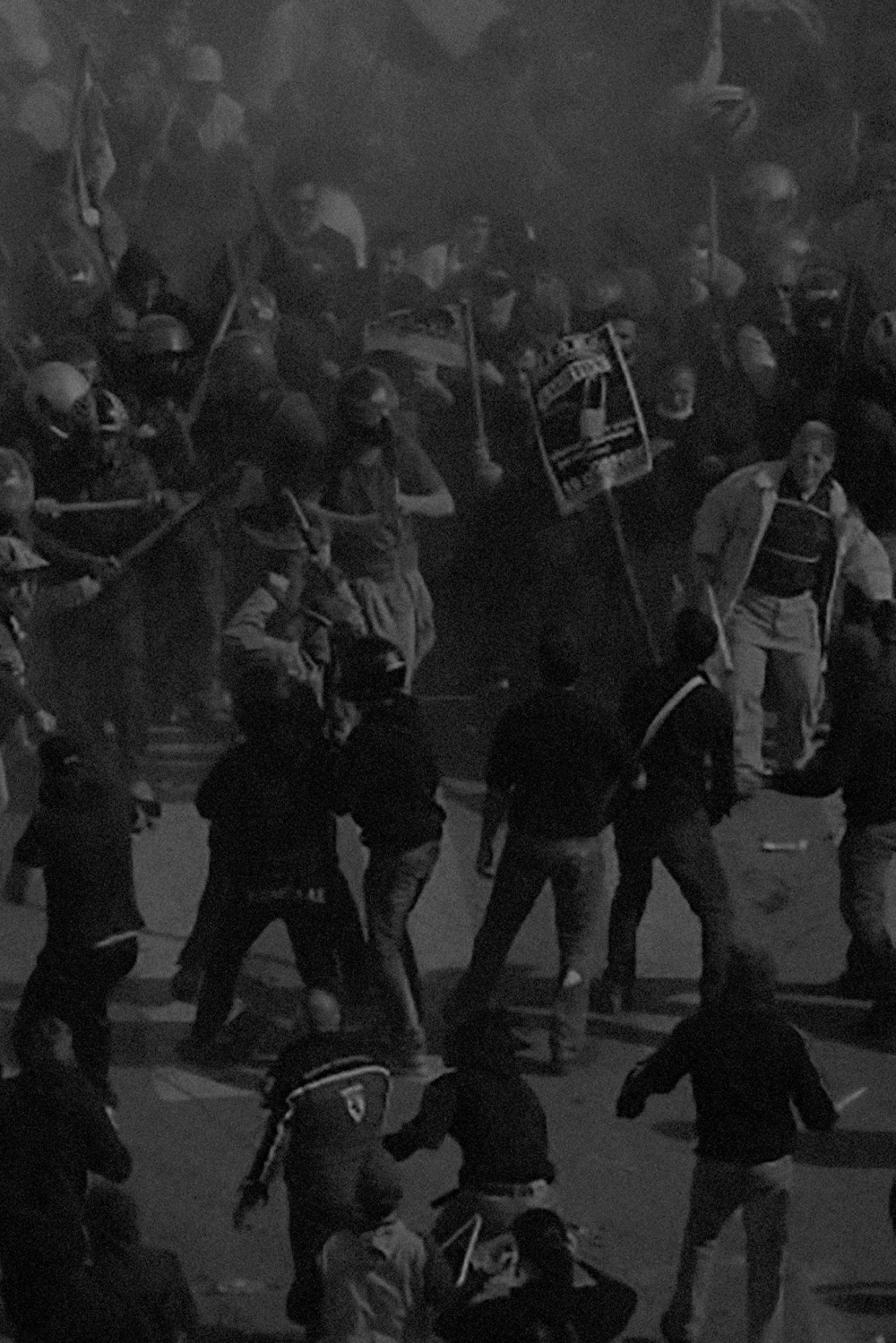 Communists clash with black-clad youths near the Parliament building in Syntagma square in Athens
