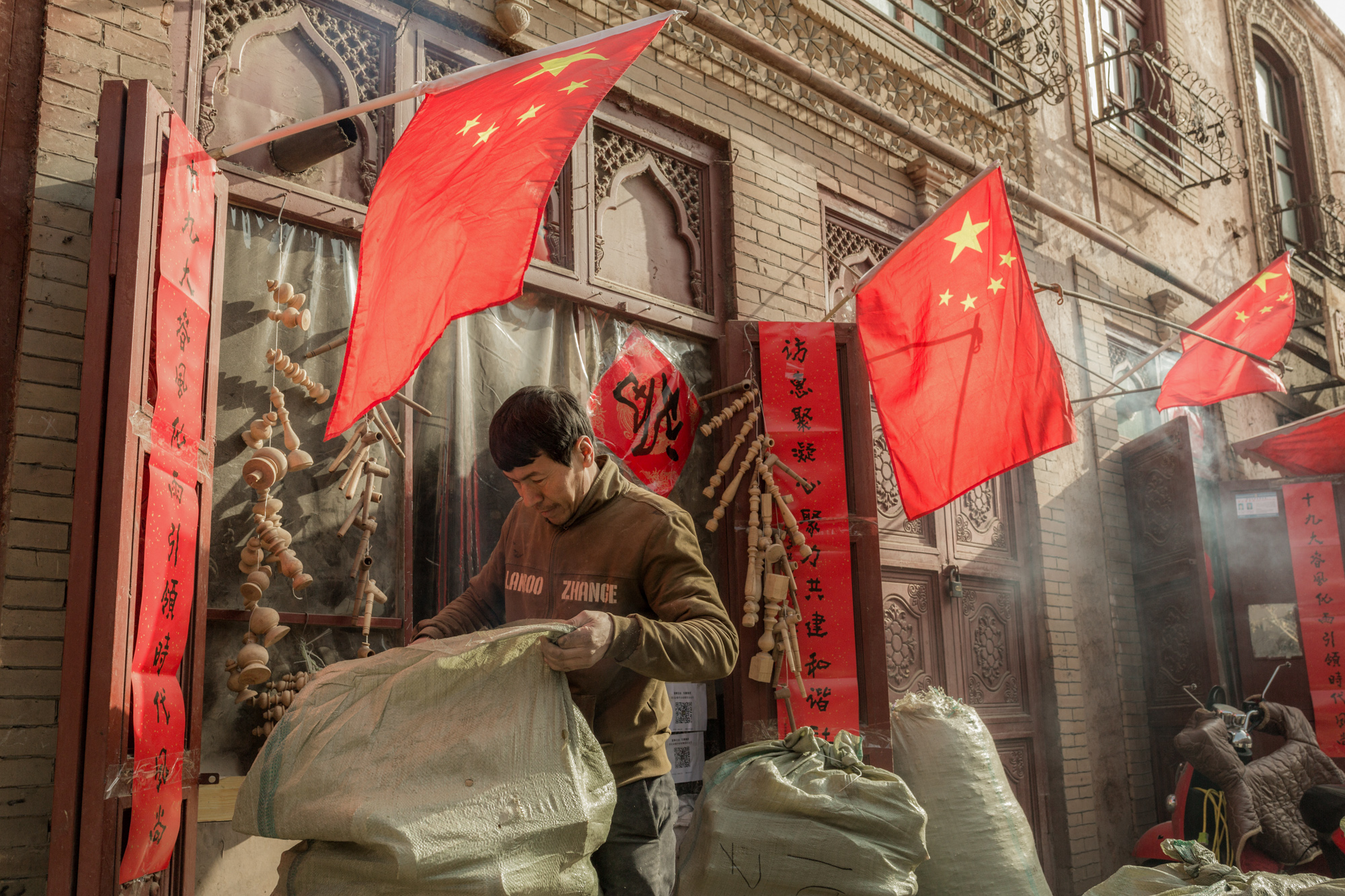 February 1st 2019. Uighur-minority store owner in front of his store.